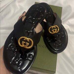 Gucci Black Leather Thong Sandals with Gold GG Hardware